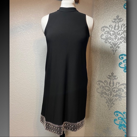 Annalee & Hope Embellished Hemline Sleeveless Black Dress
Size XS - Picture 2 of 15